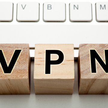 features hotspot shield vpn service vpn word formed from wooden blocks in front of white computer keyboard